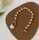 Butterfly Pendant Pearl Bracelet